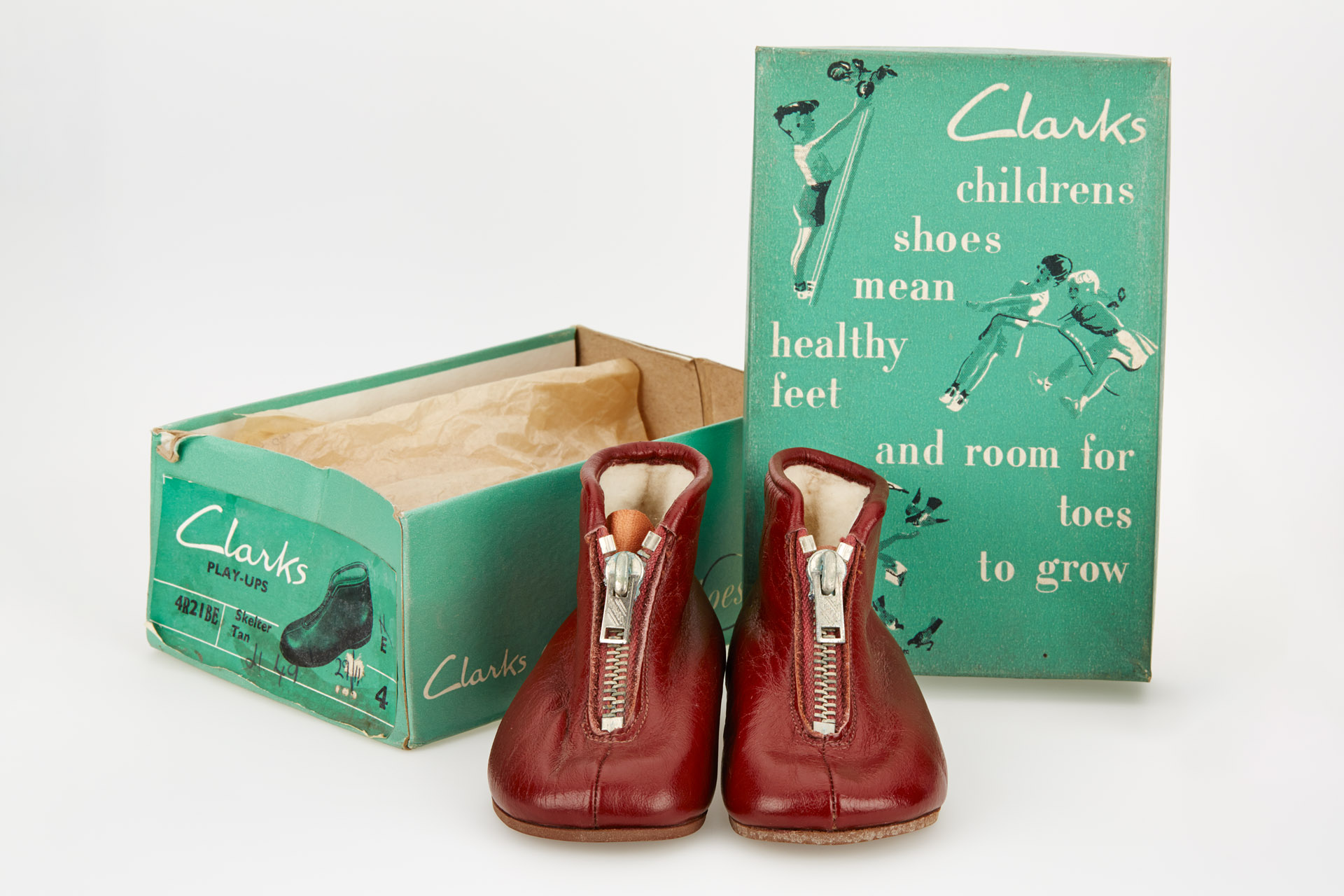 Pair infants' 'tan' brown leather front zip ankle boots with an original box; Clarks Play-ups 'Skelter', 1959-c. 1961